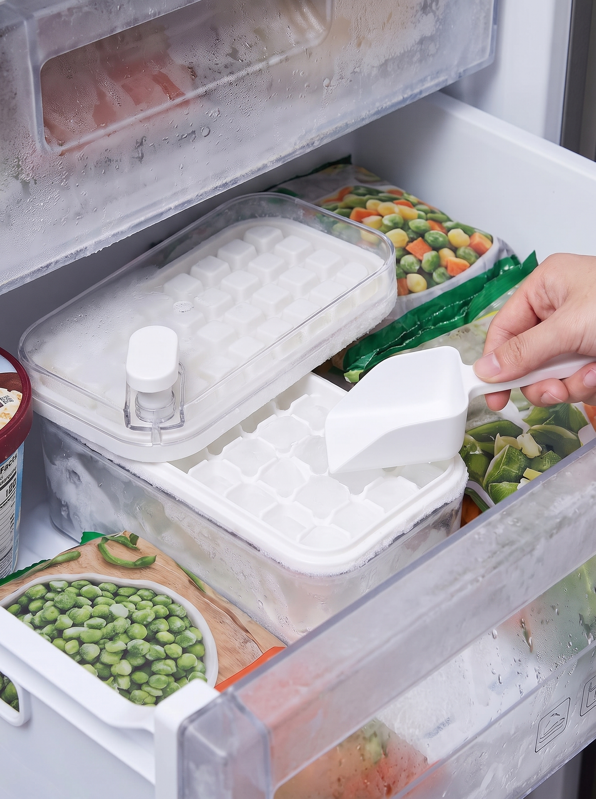Ice tray system stored in a freezer drawer
